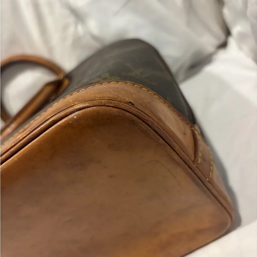 Louis Vuitton Alma Monogram Coated Canvas Handbag - Picture 7 of 16